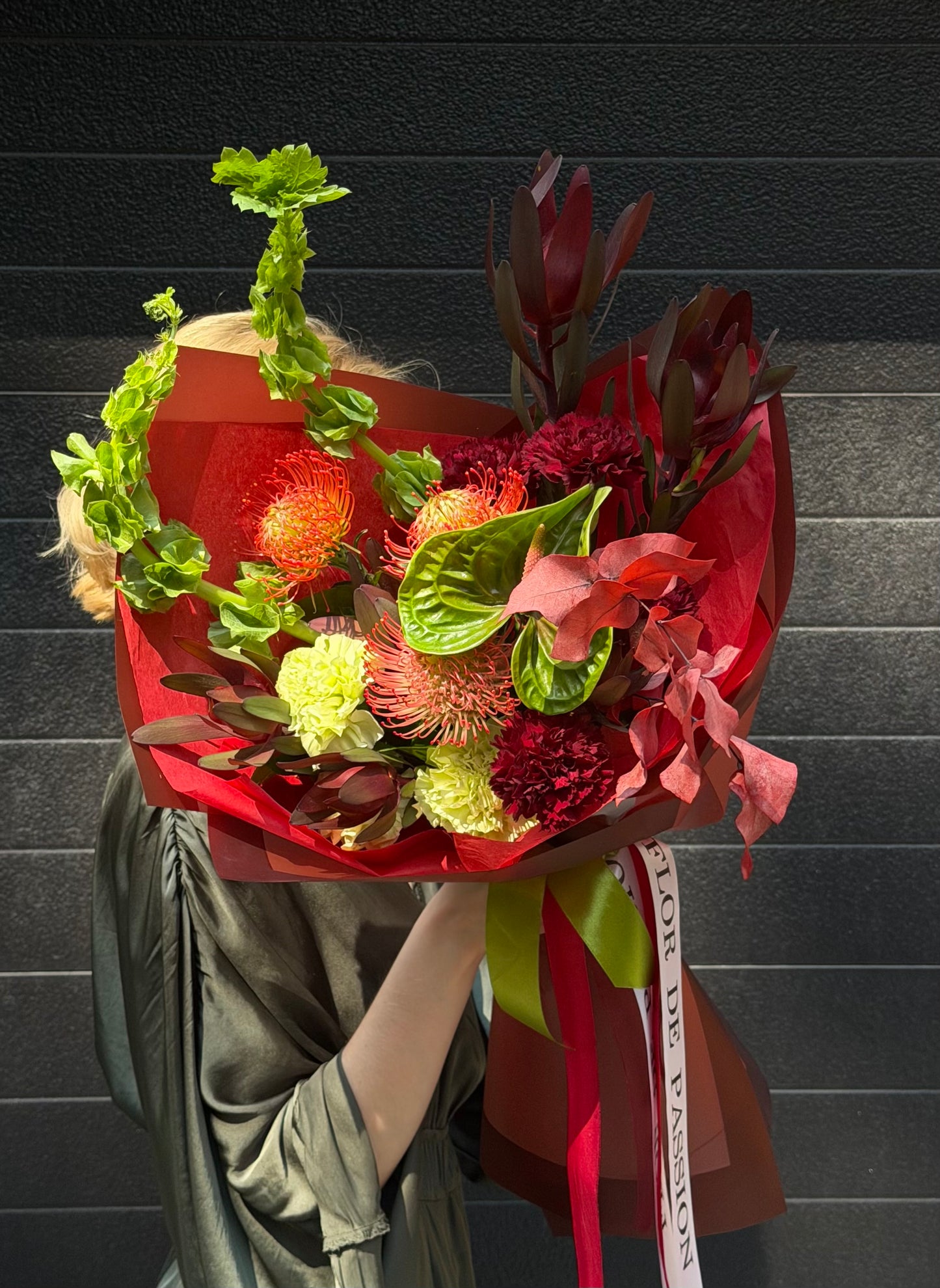 “Feral Bloom” Bouquet (Anthurium, Pincushion, Bells of Ireland, Dianthuses, Leucadendron, Autumn Leaves)