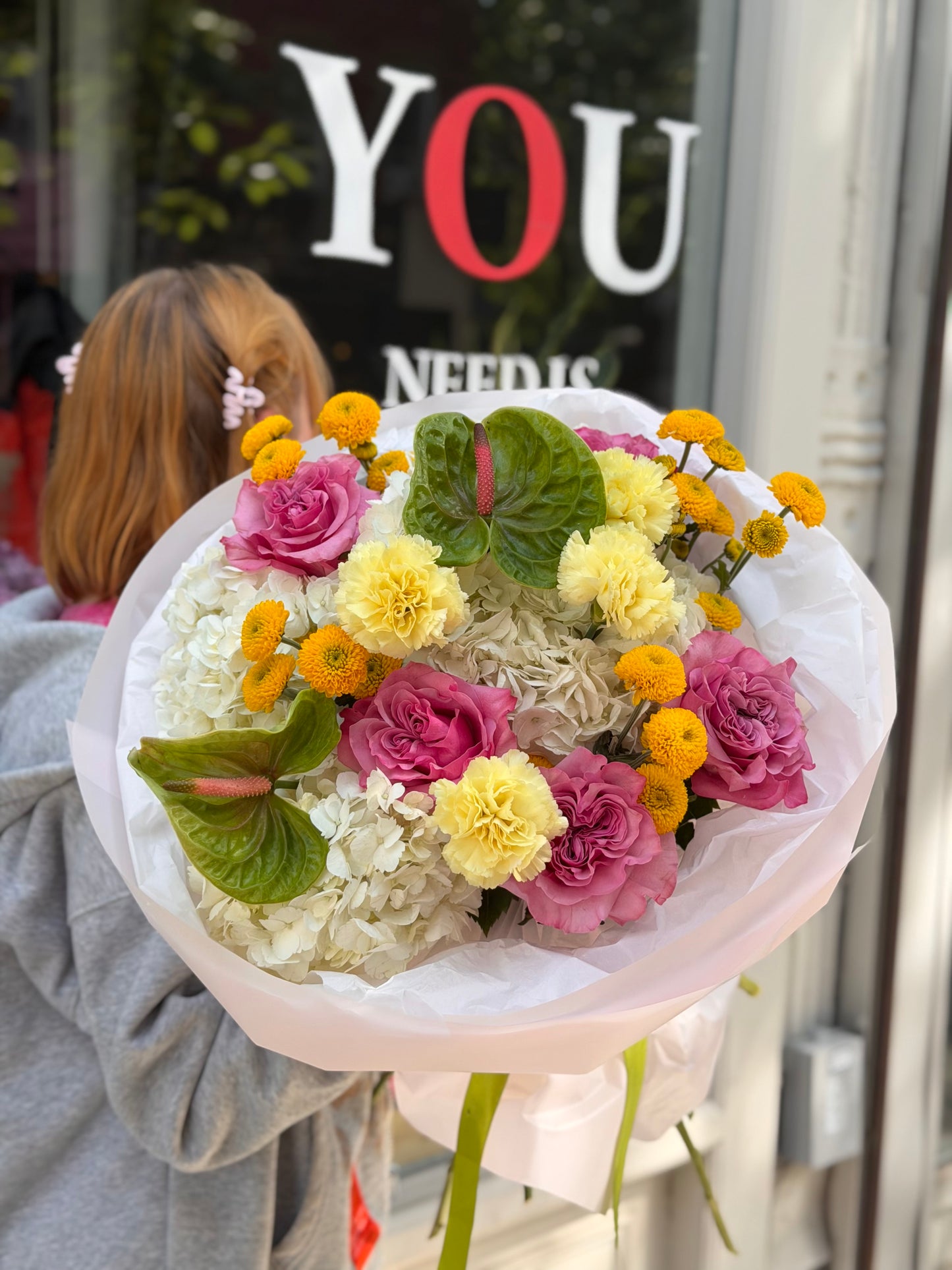 “Certified Rizz” (Garden Roses, Anthurium, Hydrangeas, Buttons, Carnations)