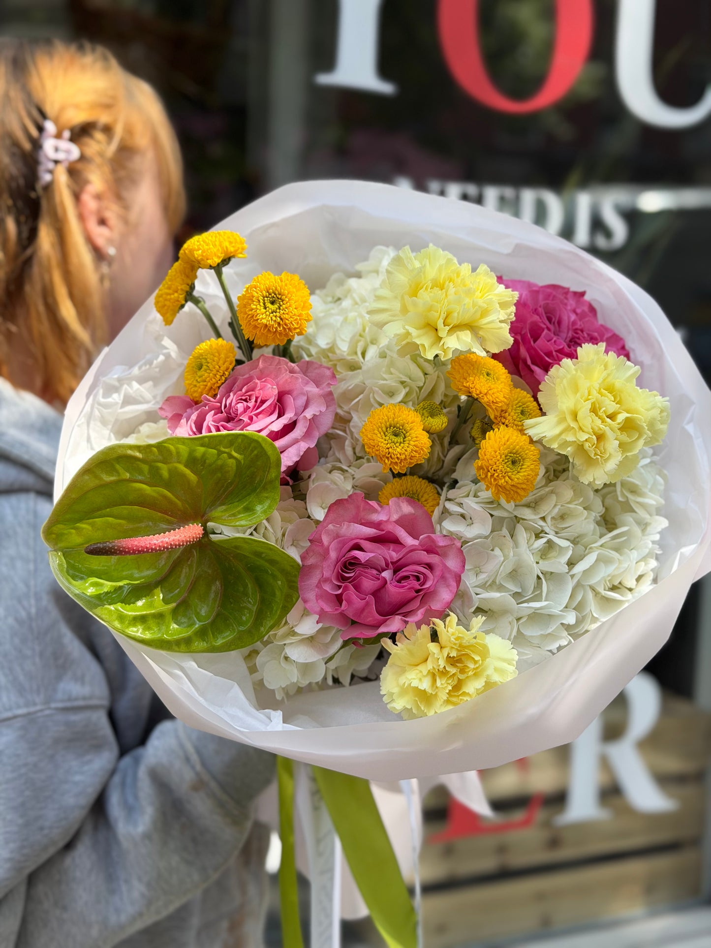 “Certified Rizz” (Garden Roses, Anthurium, Hydrangeas, Buttons, Carnations)