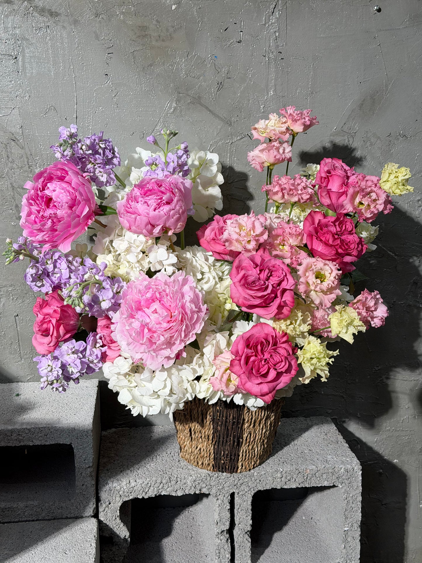 “Pink Champagne” Basket (Country Blues Roses, Peonies, Lisianthus, Stocks, Hydrangeas)